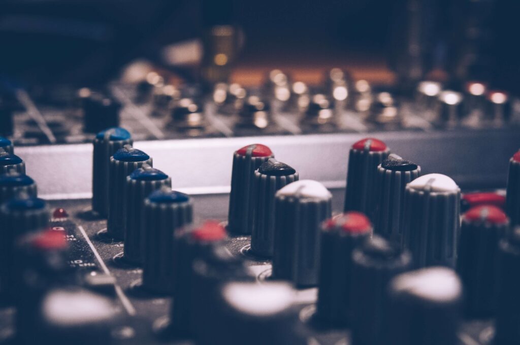 closeup of knobs on audio equipment